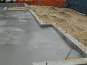 Garage corners sloped away from foundation