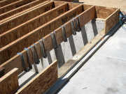 Hangers for floor overhang