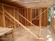 Walls are braced before floor is installed