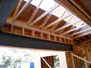 Knee wall on top of steel garage header
