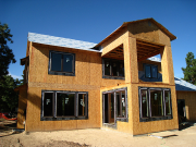 View of rear of house with windows installed
