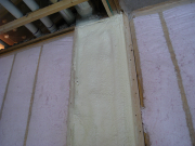HVAC chase between kitchen and garage insulated with spray foam