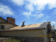 roof shingles being stripped