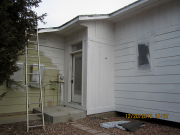 vertical siding on mud room is finished