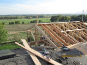 east part of roof is framed with cut rafters