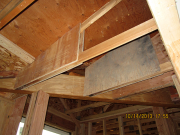 old trusses repaired with plywood gussets