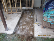 concrete patio is cut for new septic line