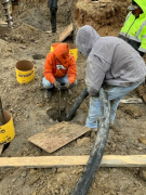 Placing concrete into drilled hole