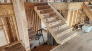 Upper stairs with open stringer installed