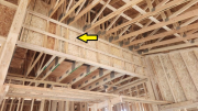 Attic knee wall extended to 5-inch depth to receive insulationÂ