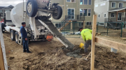 Concrete being placed in caisson hole