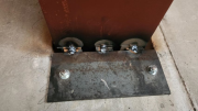 Basement steel beam shims are welded