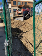 Grading backfill at entry