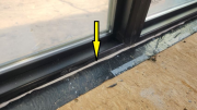 Solarium window set in sealantÂ