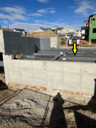 Steel beams for garage floor in place