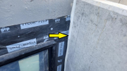 Window wells sealed against foundationÂ