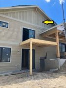 Rear upper gable with board and batten