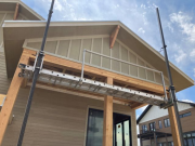 Rear porch gable board and batten completed