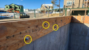 Three bolt pattern of LVL ledgers parallel to joist