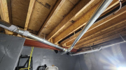 Sealed ducts in crawlspace below studio