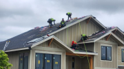 Roofers finishing roofing installationÂ
