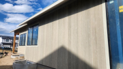 Vertical siding on west wall