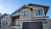 Front of house with siding finished