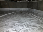 Radon air barrier in upper crawlspace
