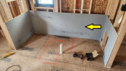DenShield installed behind tub deck to hold insulationÂ
