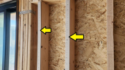 Studs are shimmed before drywall for perfect wall