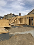 Paul and Bob laying out subfloor