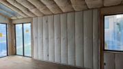 Walls are insulated with 2 inch closed cell foam & blown fiberglassÂ