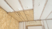 Extra insulated lid to protect plumbing drains in garage ceilingÂ
