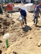 Compacting for wall base