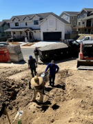 Gravel for wall base being unloaded