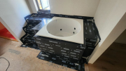 Tub deck protected with Vycor flashingÂ