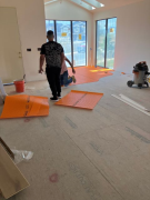 Installing Schulter Ditra mat in solarium & entry