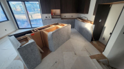Floor & base cabinets are wrapped with innovative reusable material for protectionÂ