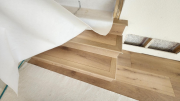 Hardwood stairs are finished and protectedÂ