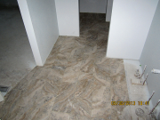 New tile floor in master bath & closet