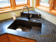 New modern sink and countertops in kitchen