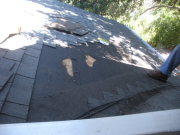 Removed shingles to check existing underlayment