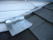 Step flashing incorrectly installed (original roof)