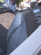 Installing underlayment ice & water shield at valley