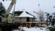 Roof beams lifted by crane