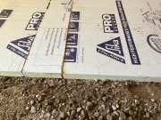 Rigid insulation cut to fit garage perimeter