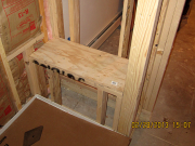 Shower seat is framed with slope for drainage