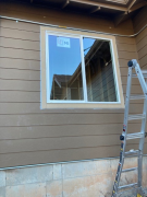 Window trimmed & caulked