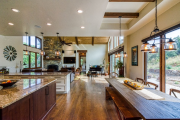 View from entry of kitchen, dining area, and great room